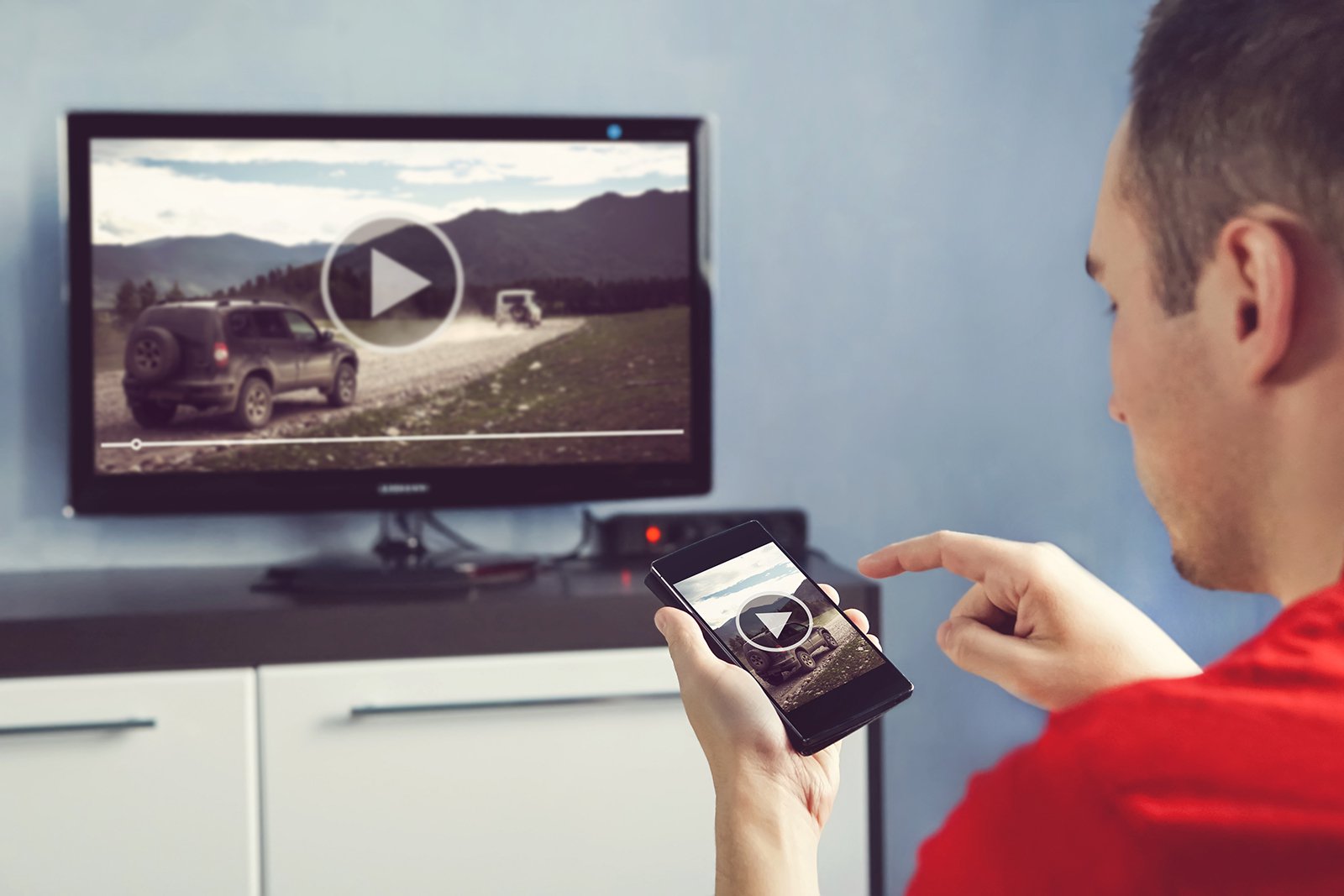 A person using a FireStick device.